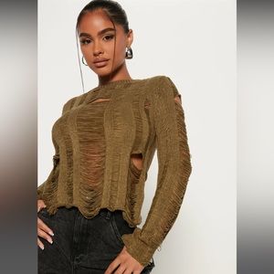 Destroyed pullover sweater